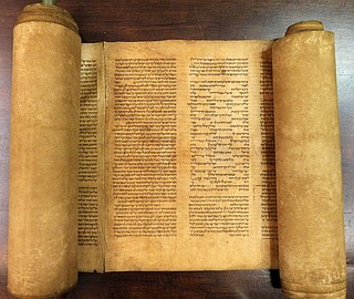 The Word of God inscribed in ancient scroll